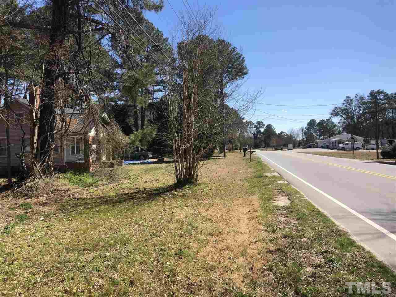 1316 West Garner Road Garner, NC 27529 - Photo 1 of 7 a view of a yard with large trees
