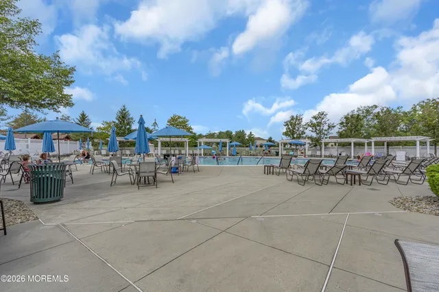 a view of a terrace with sitting area