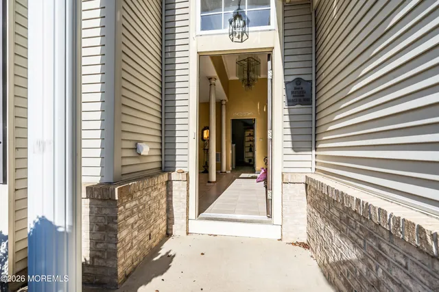 a view of a house with a door and a white door
