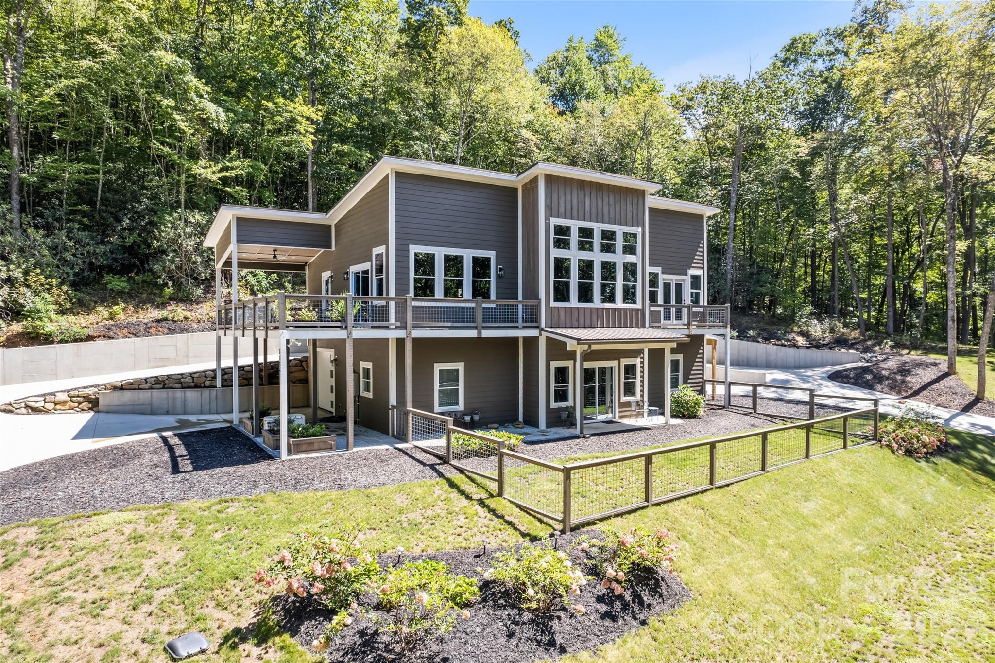 1185 Wallalieu Road Otto, NC 28763 - Photo 2 of 43 aerial view of a house with swimming pool and sitting area