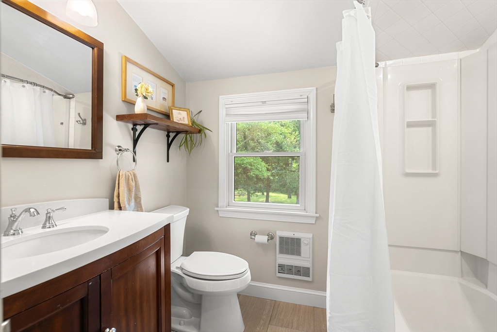 35 Spallus Road Stoughton, MA 02072 - Photo 28 of 39 a bathroom with a sink toilet and mirror