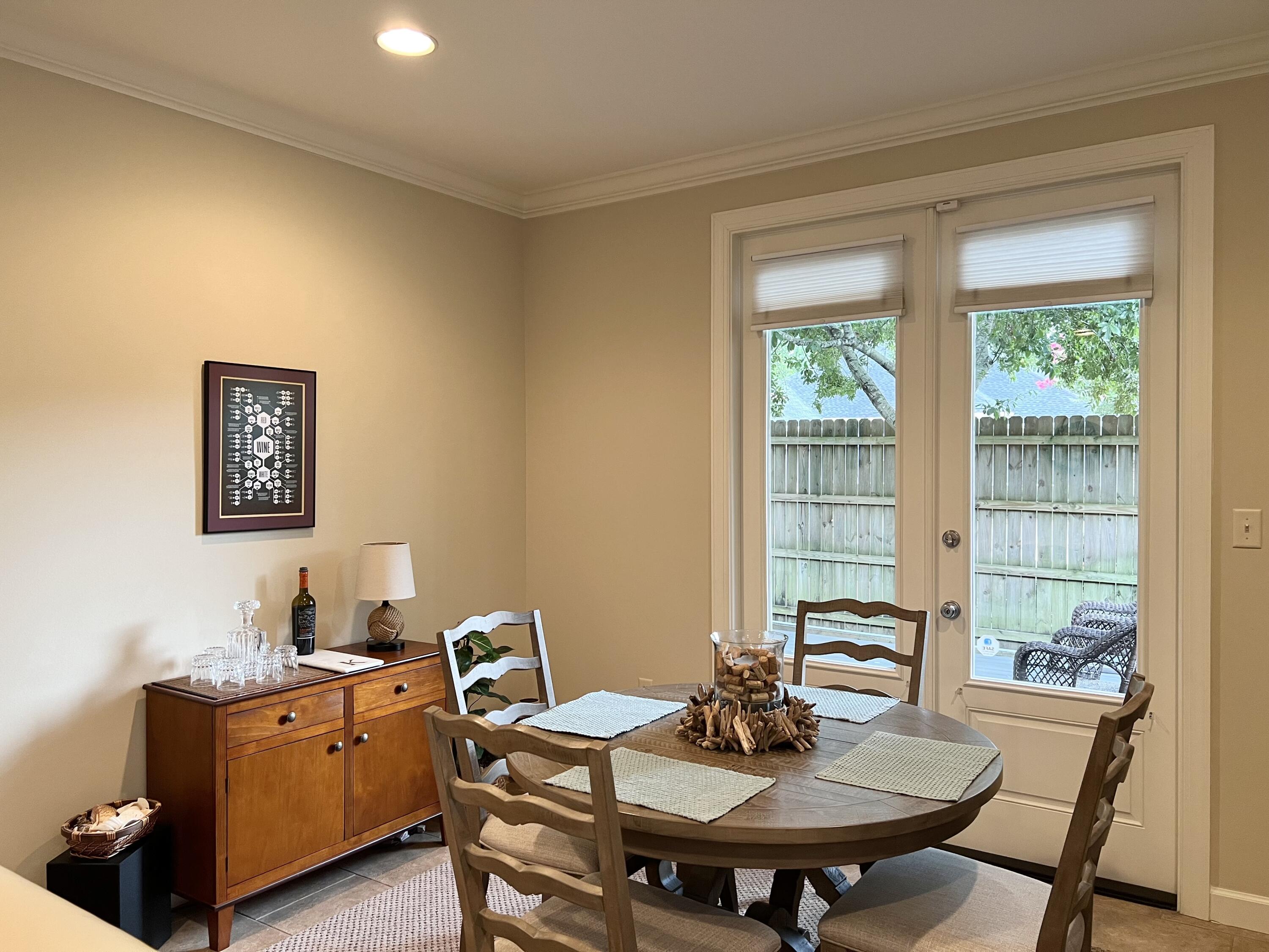 4248 Skipjack Cove Niceville, FL 32578 - Photo 11 of 64 a dining room with furniture and window
