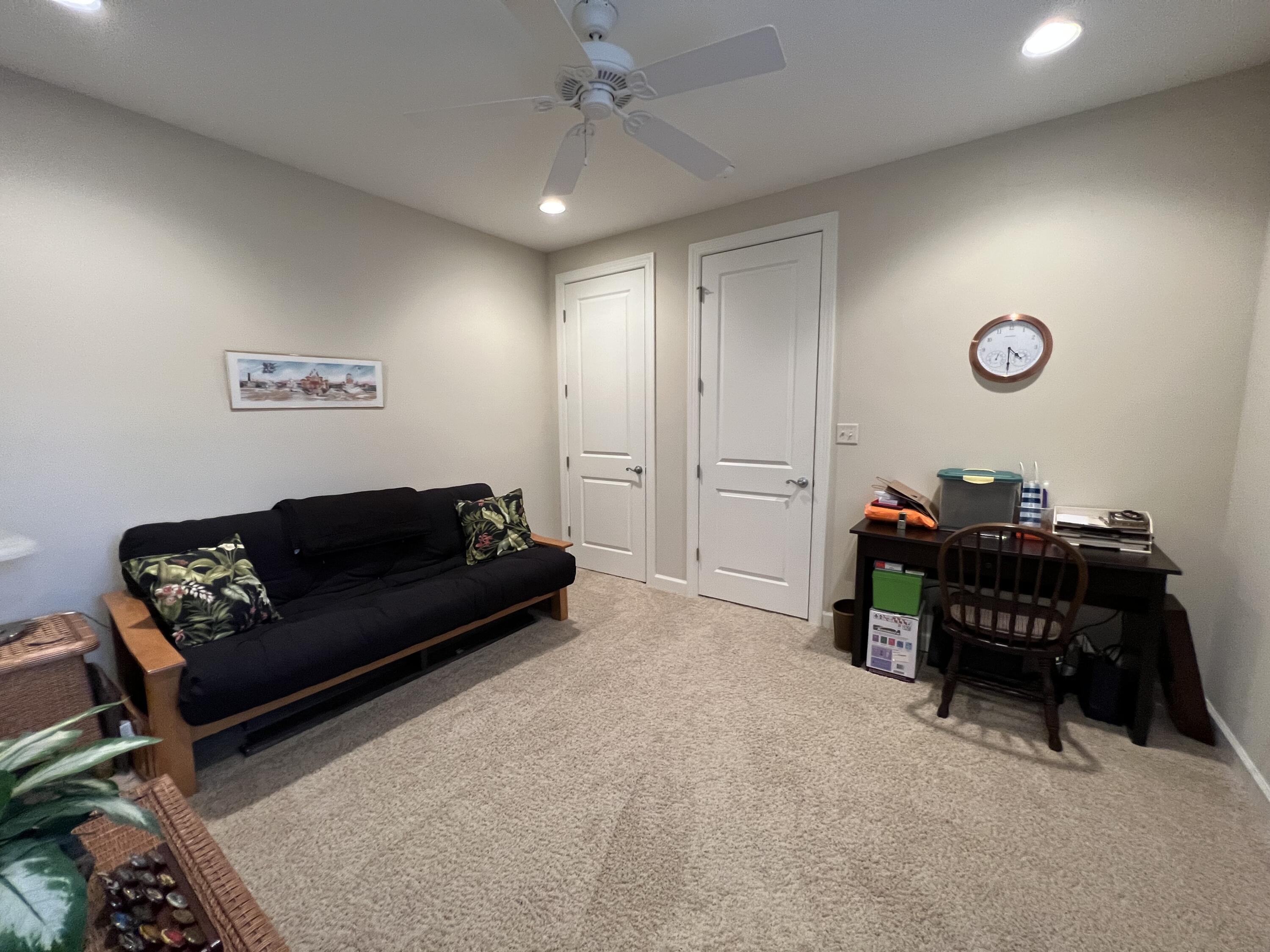 4248 Skipjack Cove Niceville, FL 32578 - Photo 53 of 64 a living room with furniture a dining table and a piano table