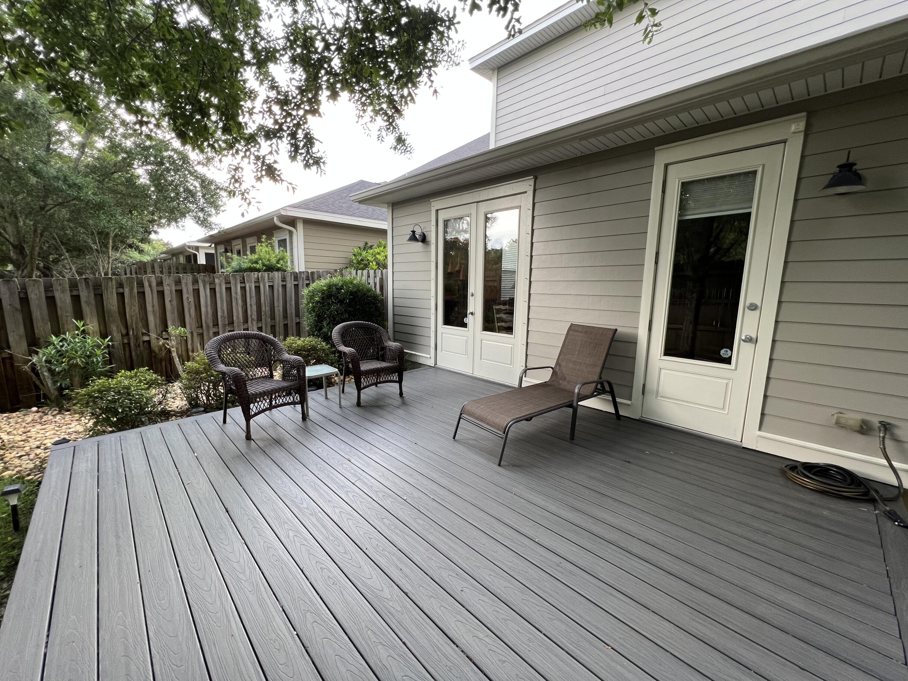4248 Skipjack Cove Niceville, FL 32578 - Photo 60 of 64 a view of house with deck outdoor seating and wooden floor