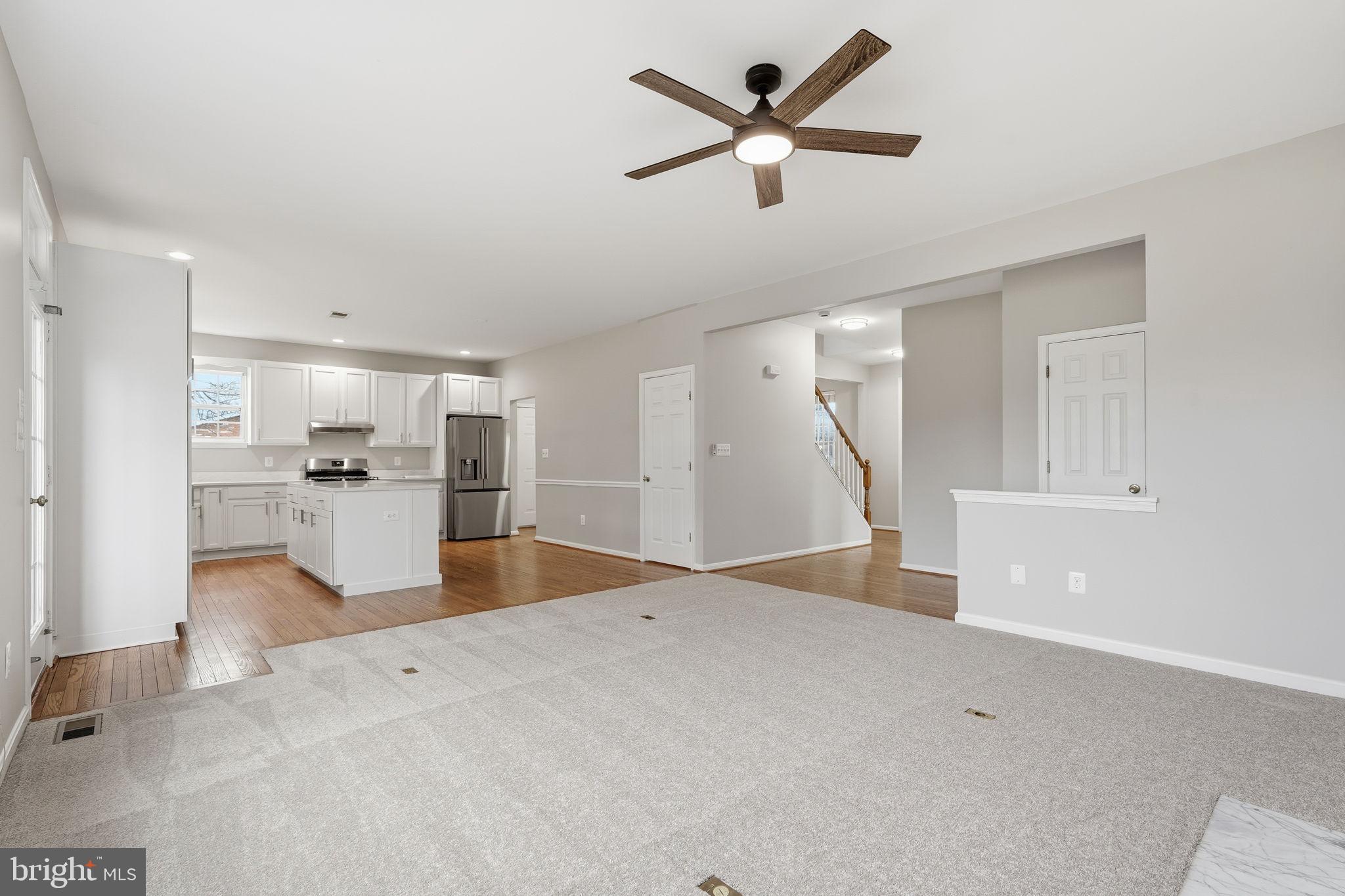 8310 Rolling Road Manassas, VA 20110 - Photo 17 of 58 Living Room open to the kitchen