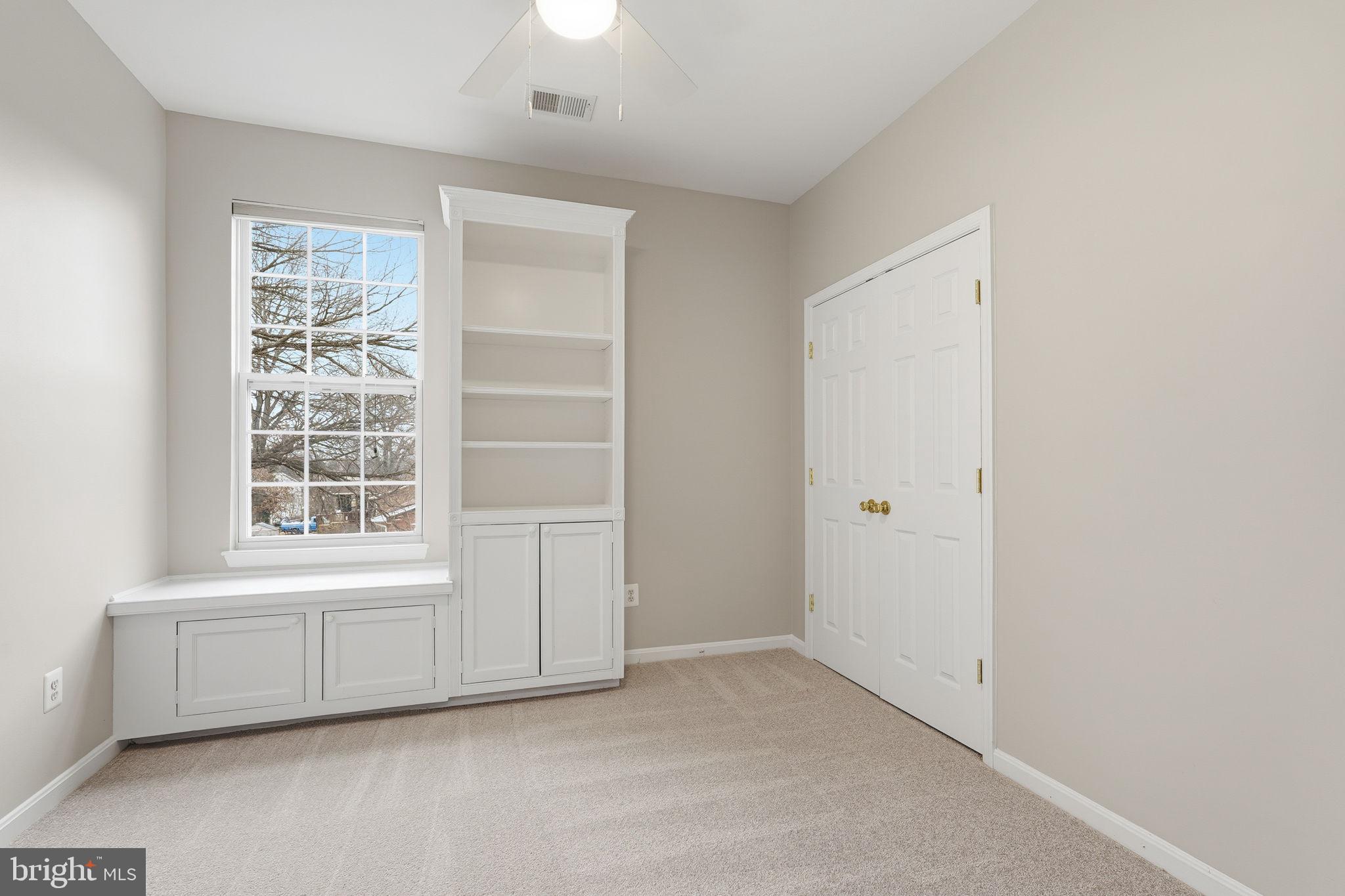 8310 Rolling Road Manassas, VA 20110 - Photo 24 of 58 a view of an empty room with a window