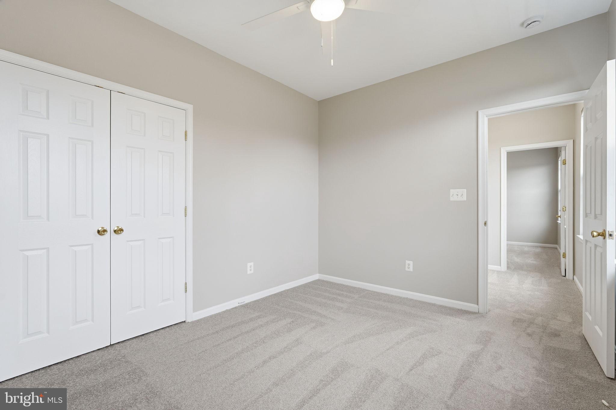8310 Rolling Road Manassas, VA 20110 - Photo 26 of 58 a view of an empty room and closet area