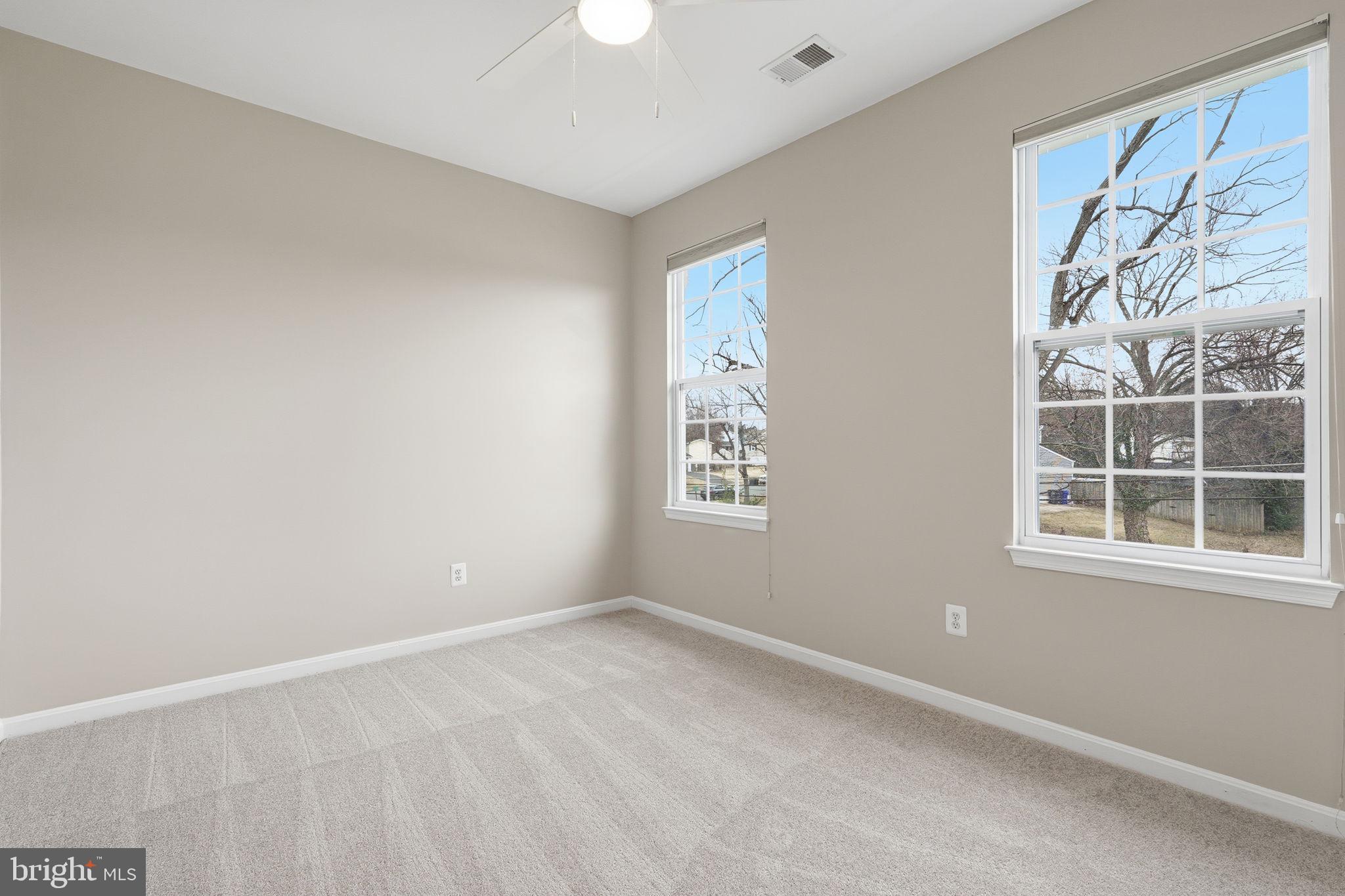 8310 Rolling Road Manassas, VA 20110 - Photo 29 of 58 an empty room with a window