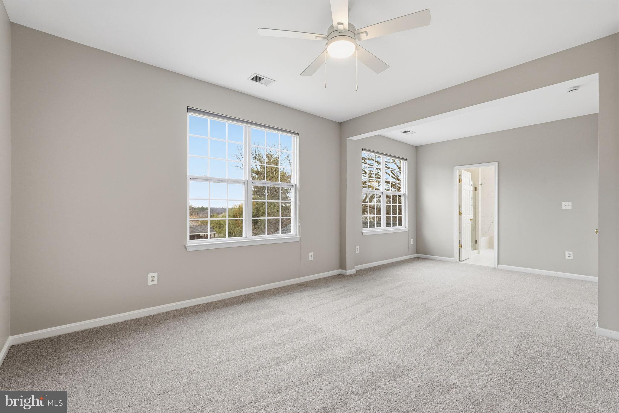 8310 Rolling Road Manassas, VA 20110 - Photo 32 of 58 a view of an empty room with a window