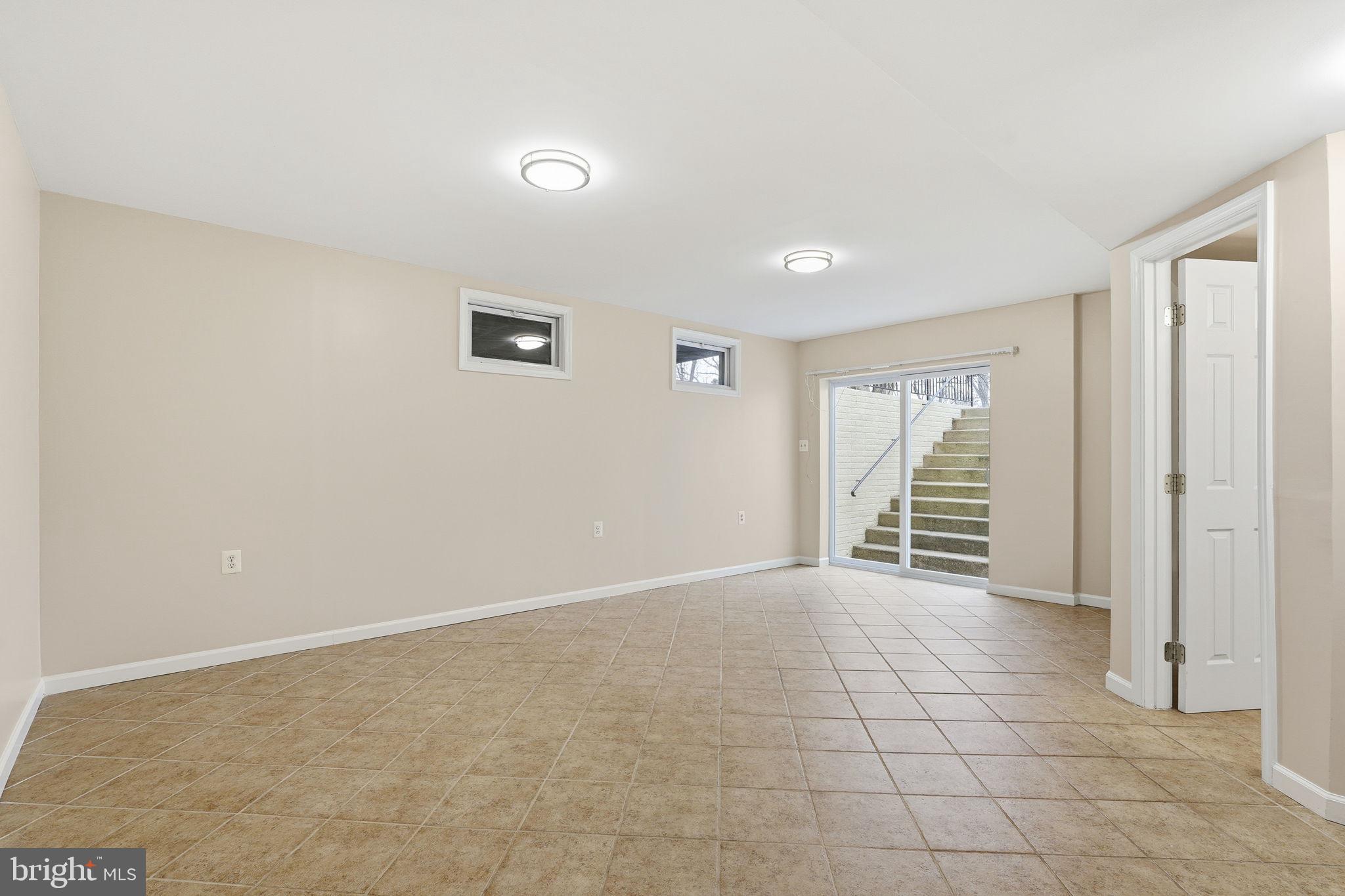 8310 Rolling Road Manassas, VA 20110 - Photo 40 of 58 a view of an empty room with a window
