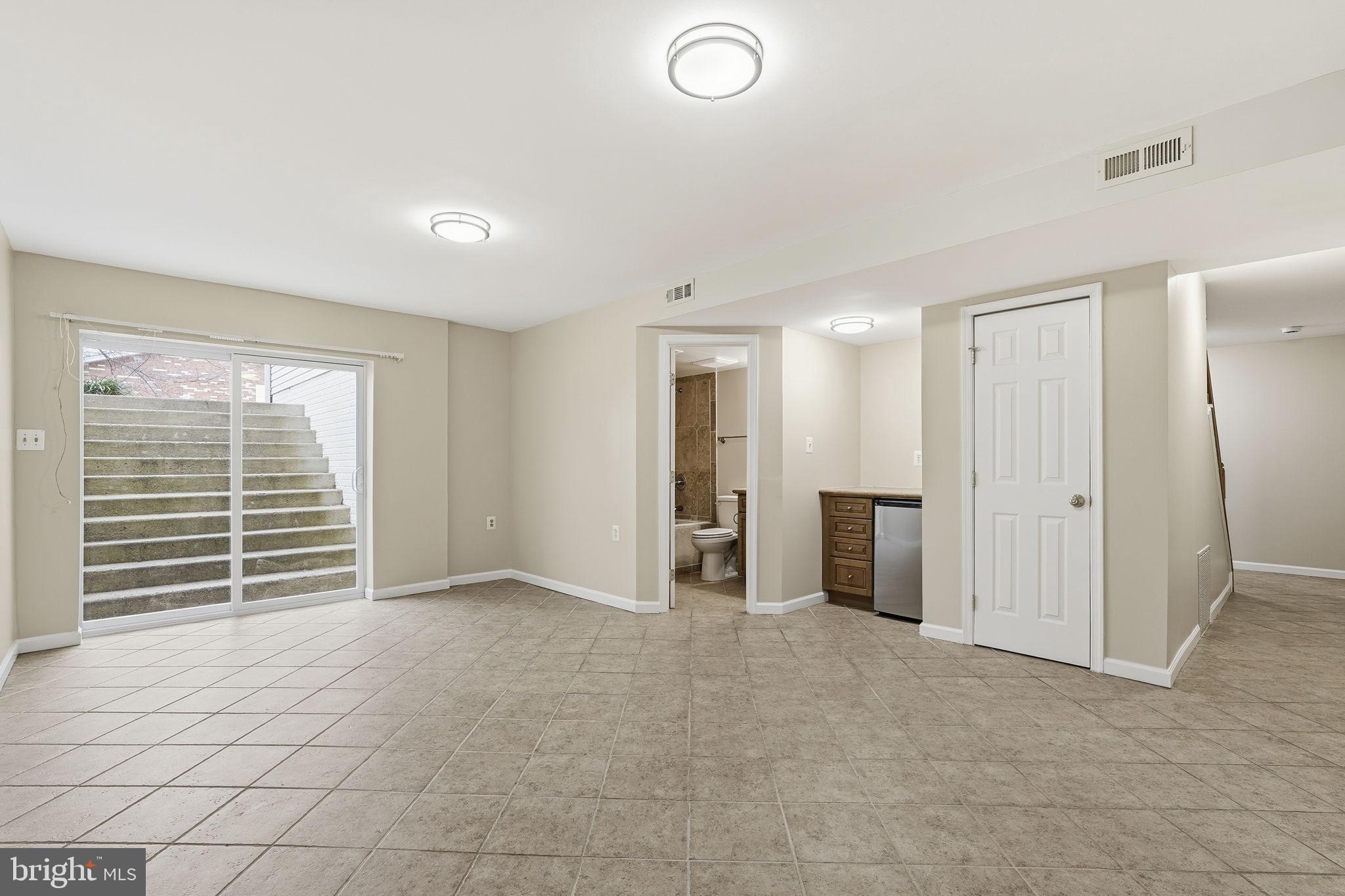 8310 Rolling Road Manassas, VA 20110 - Photo 41 of 58 an empty room with windows and closet