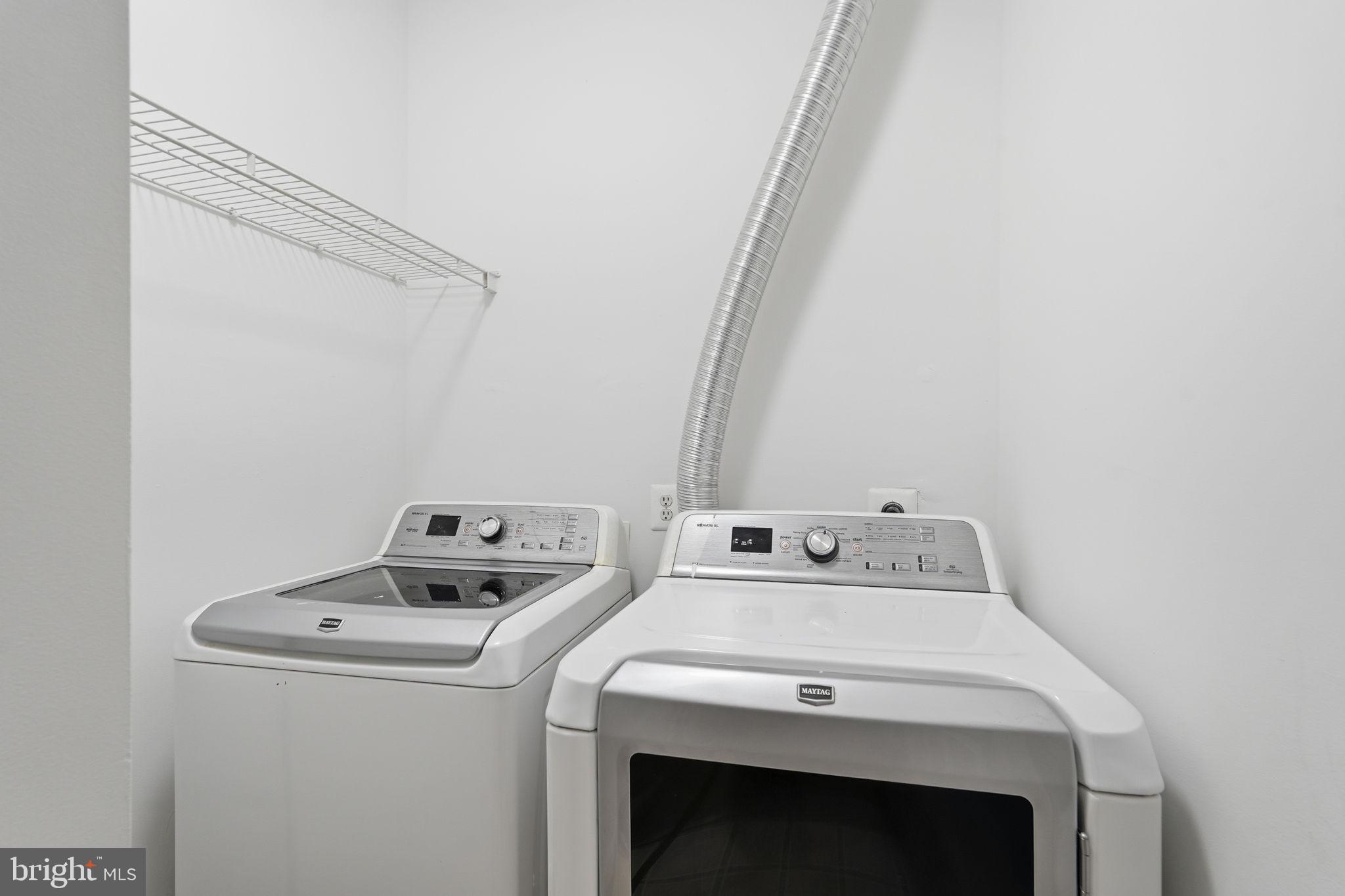 8310 Rolling Road Manassas, VA 20110 - Photo 43 of 58 a utility room with dryer and washer
