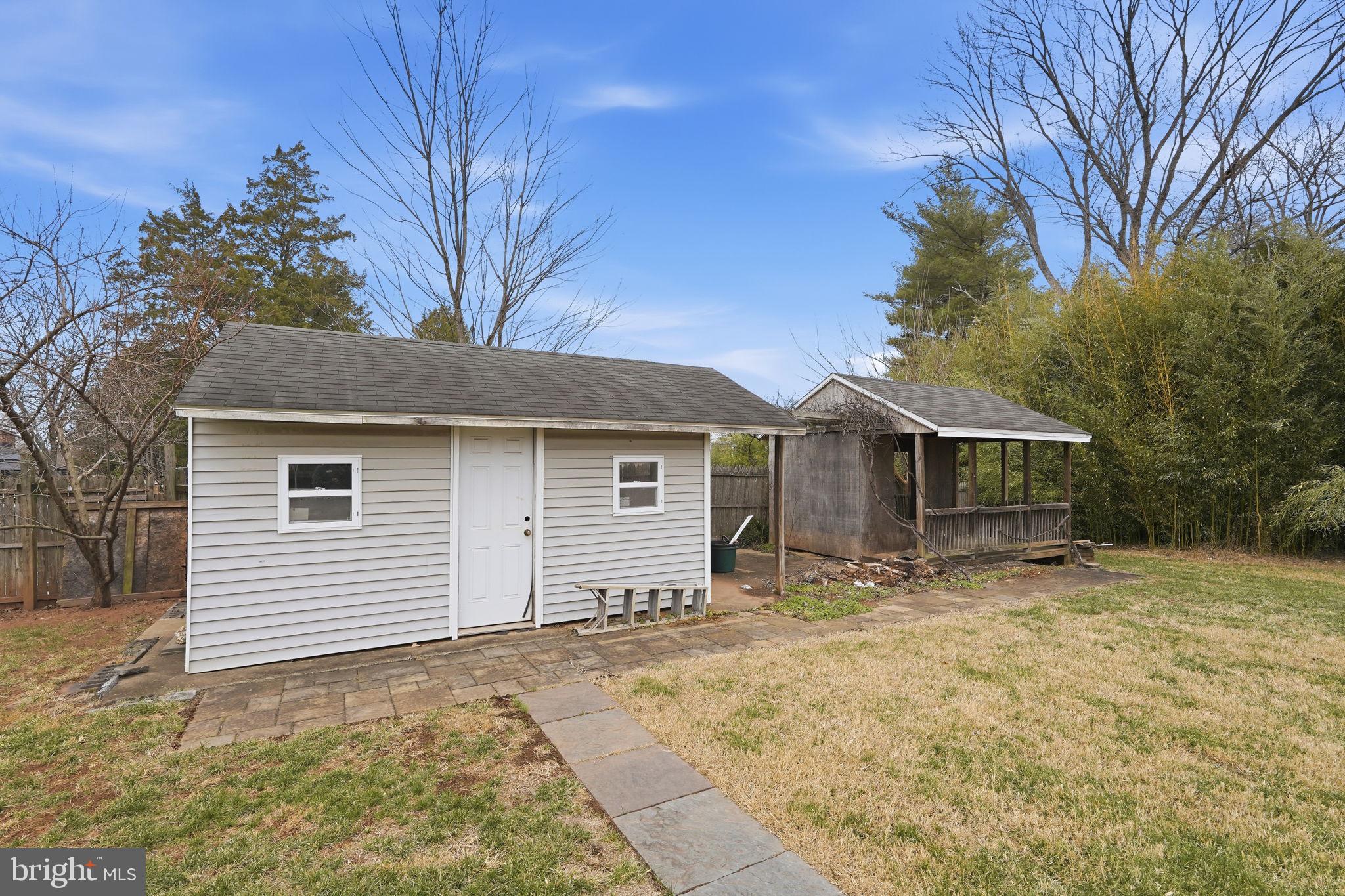8310 Rolling Road Manassas, VA 20110 - Photo 46 of 58 a view of a house with a yard