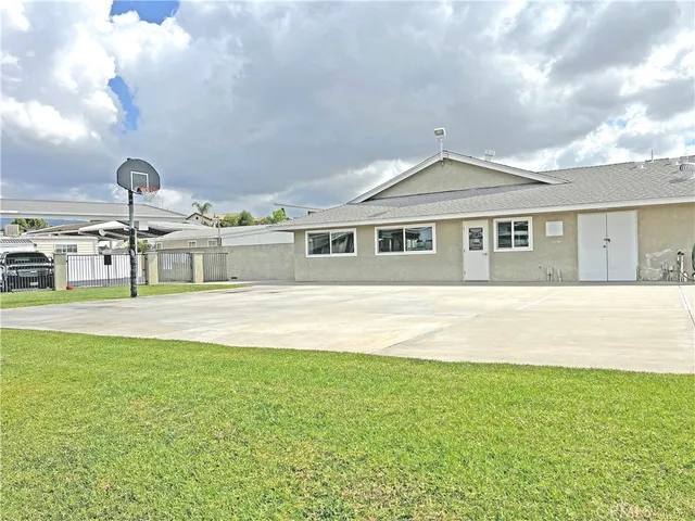 a view of a big yard of an apartment building