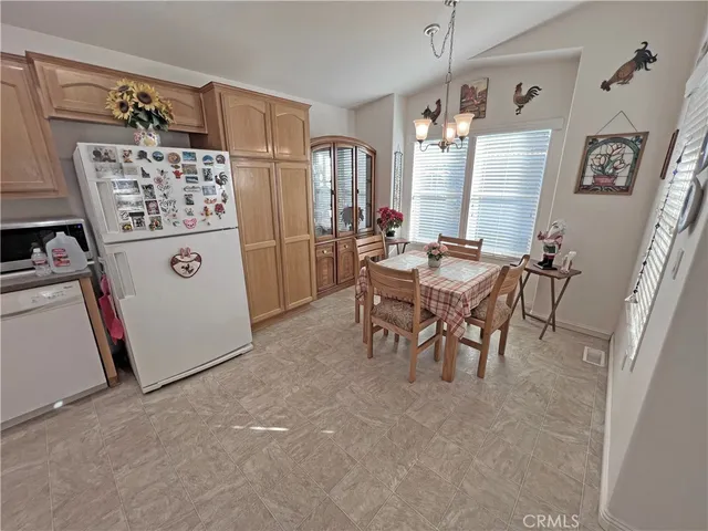 a view of a livingroom with furniture and window