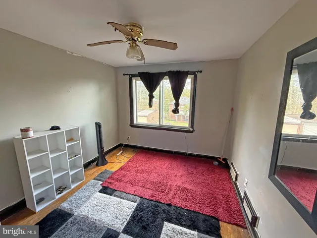 a bathroom with a tub and shower