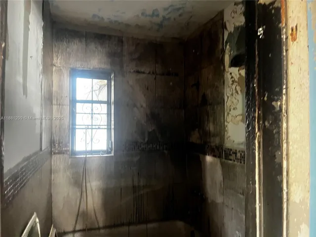 a view of an entryway with a window