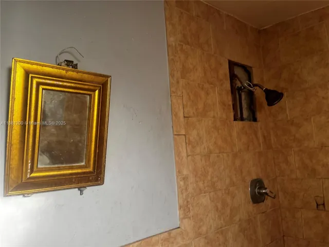 a kitchen with a sink and a stove