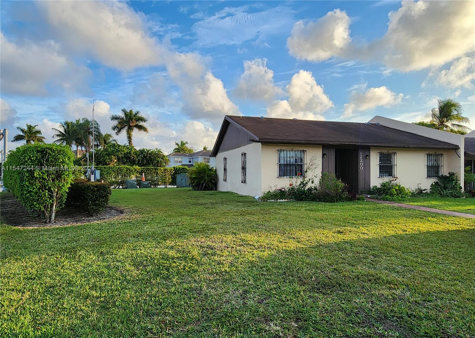 The Crossings Miami, FL 33186 - Photo 1 of 19 a front view of house with yard and green space