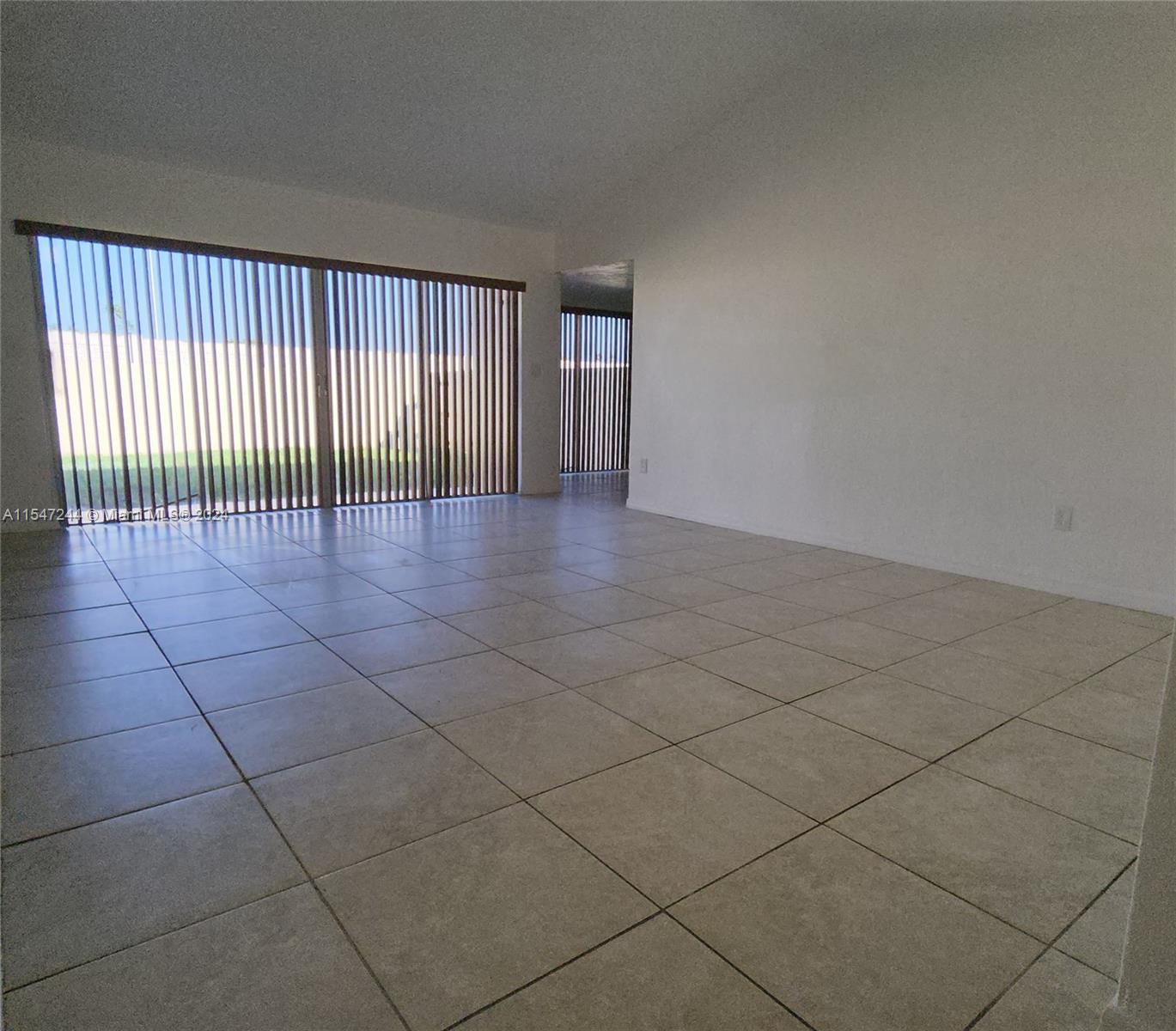 The Crossings Miami, FL 33186 - Photo 14 of 19 a view of an empty room and a window