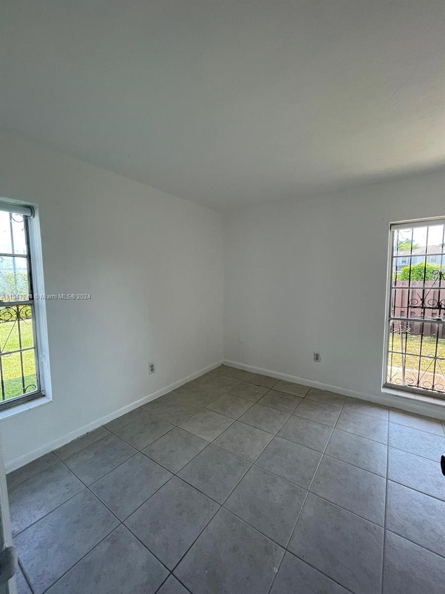 The Crossings Miami, FL 33186 - Photo 6 of 19 an empty room with windows