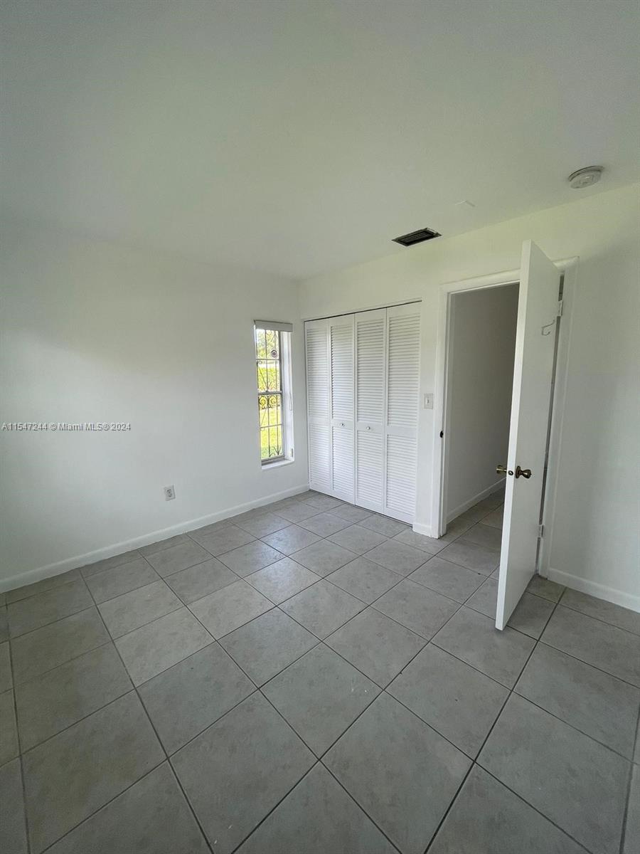 The Crossings Miami, FL 33186 - Photo 7 of 19 a view of an empty room with a window