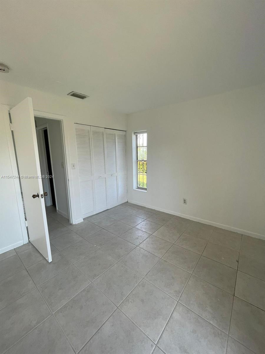 The Crossings Miami, FL 33186 - Photo 9 of 19 a view of an empty room and a window