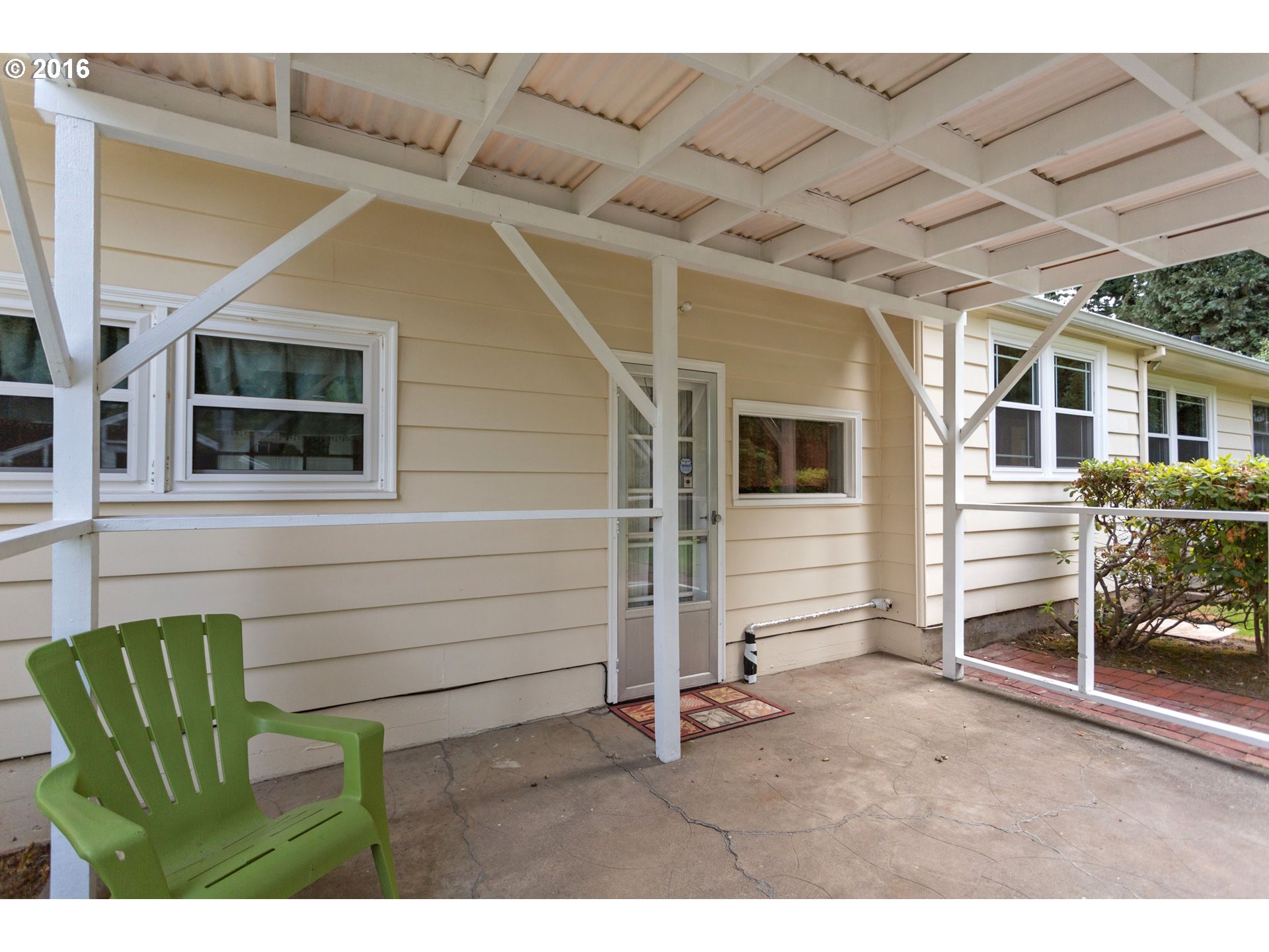 8770 Southwest Garden Home Road Portland, OR 97223 - Photo 25 of 30 a view of a porch with furniture