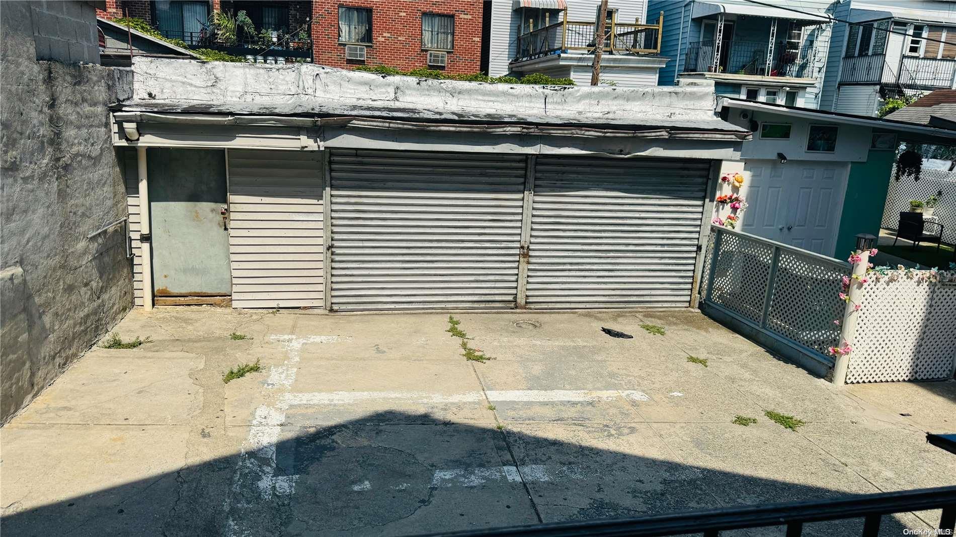 37-33 97th Street Queens, NY 11368 - Photo 2 of 14 a view of a kitchen with a sink and a stove