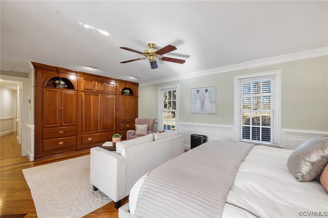 2201 Mt Blanco Road Chester, VA 23836 - Photo 17 of 49 a bedroom with a bed and a chandelier