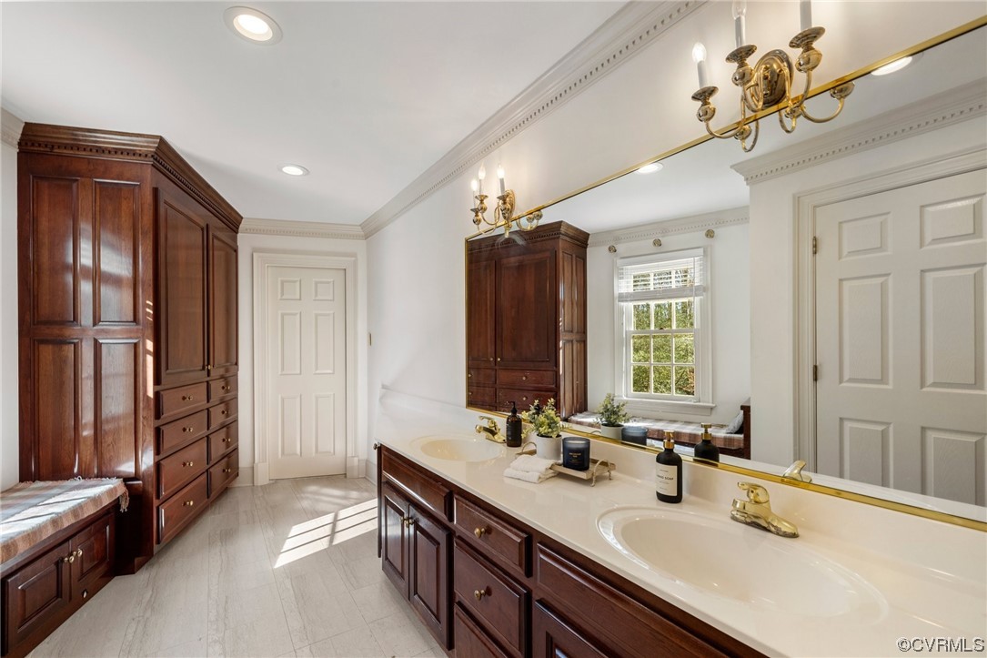 2201 Mt Blanco Road Chester, VA 23836 - Photo 22 of 49 a bathroom with double vanity sinks a vanity and a large mirror