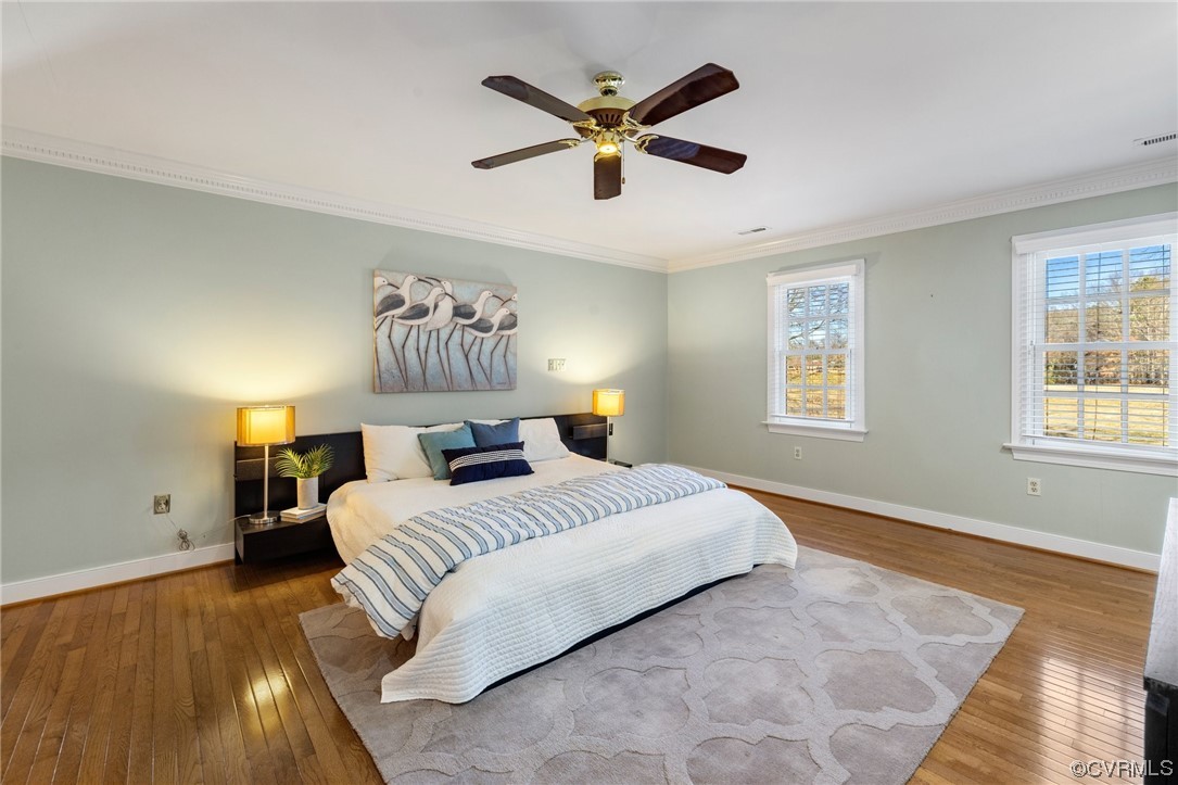 2201 Mt Blanco Road Chester, VA 23836 - Photo 29 of 49 a bedroom with a large bed and a window