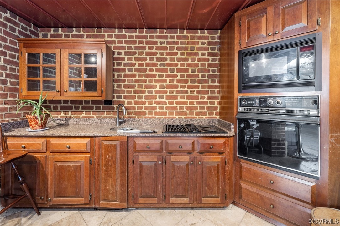 2201 Mt Blanco Road Chester, VA 23836 - Photo 40 of 49 a kitchen with granite countertop a stove top oven