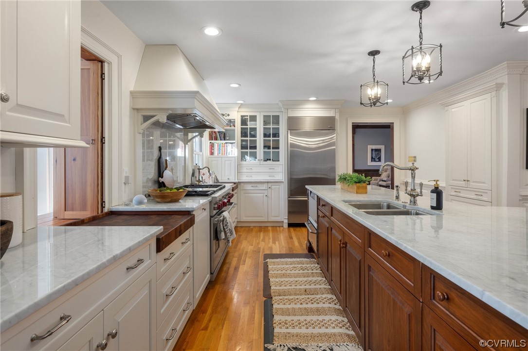 2201 Mt Blanco Road Chester, VA 23836 - Photo 10 of 49 a large kitchen with kitchen island a large counter space a sink and stainless steel appliances
