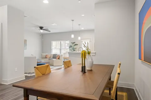 a view of a dining room with furniture