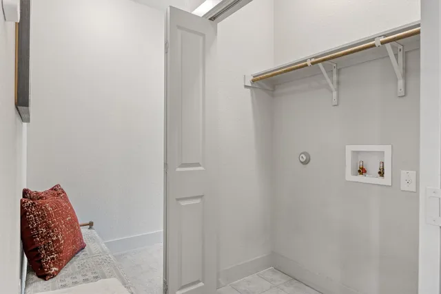 a bathroom with a shower and a mirror