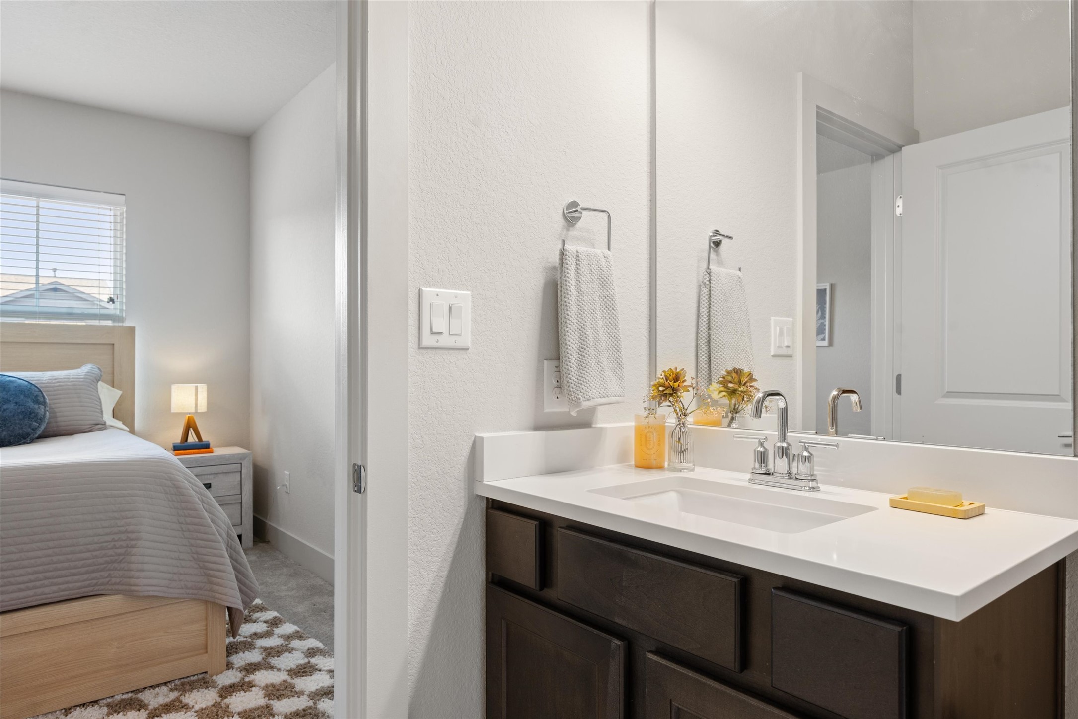 2056 Local Rebel Street Leander, TX 78641 - Photo 20 of 40 a bathroom with a sink and a mirror