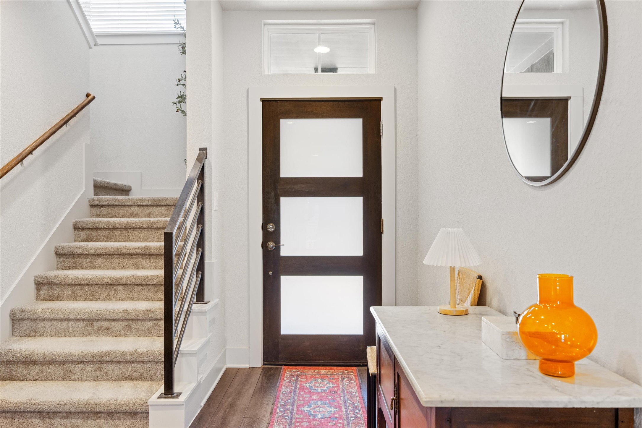 2056 Local Rebel Street Leander, TX 78641 - Photo 2 of 40 a front view of a house with wooden floor and windows