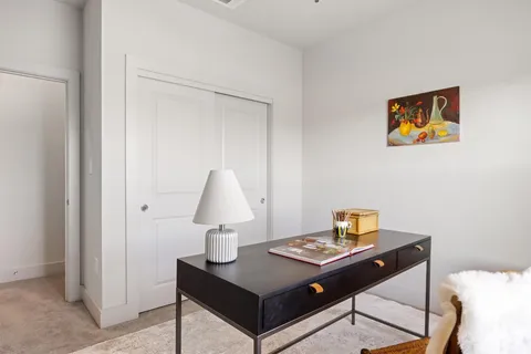 a living room with a couch and a table