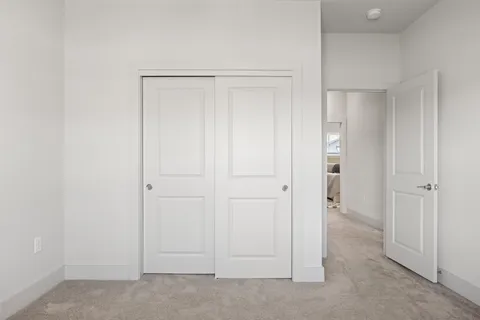 a bathroom with a shower and a mirror