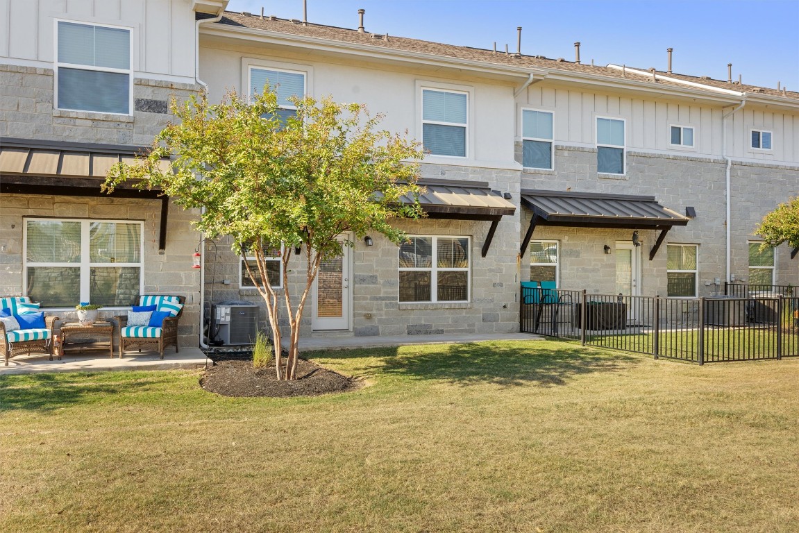 2056 Local Rebel Street Leander, TX 78641 - Photo 31 of 39 a view of a house with backyard and sitting area