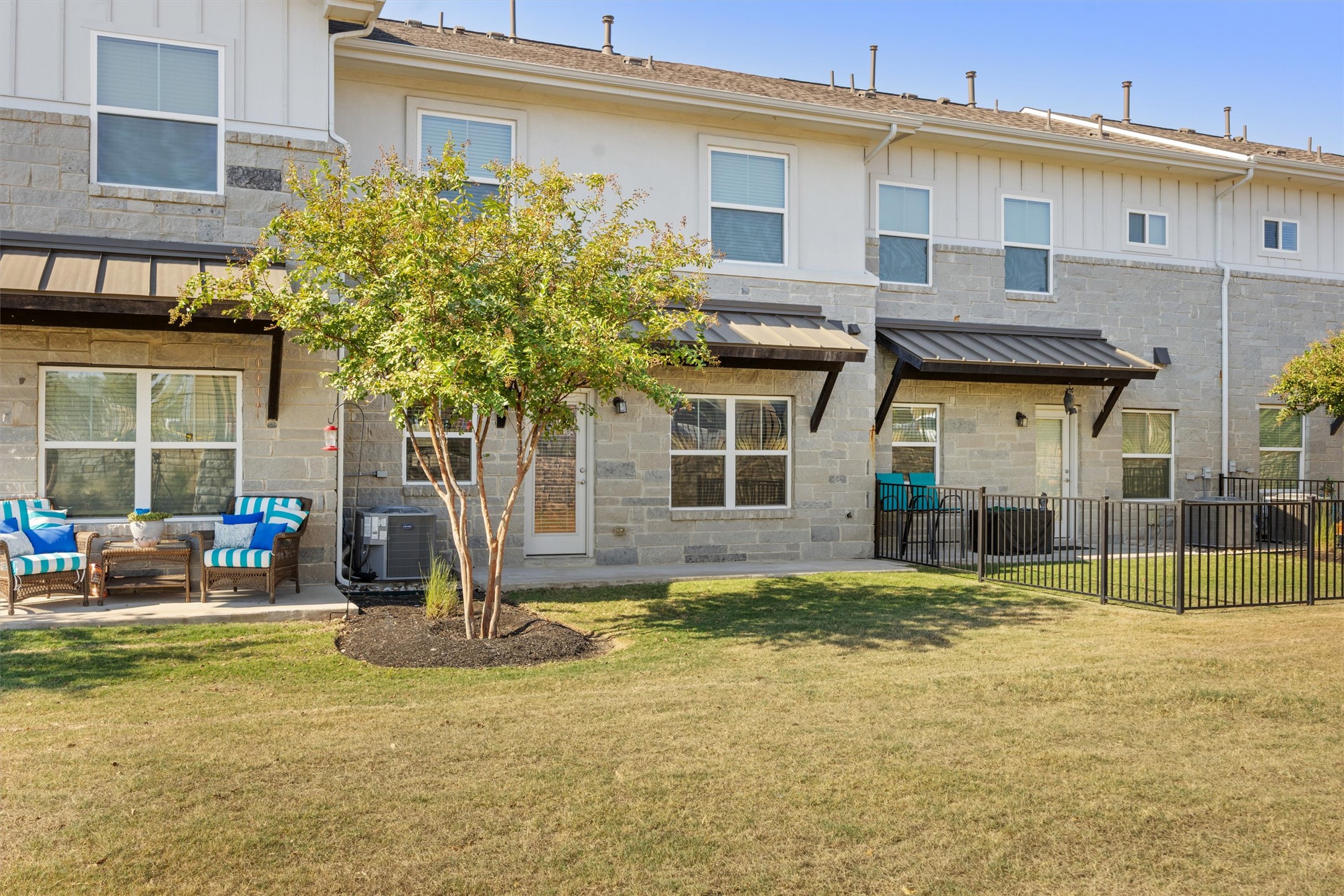 2056 Local Rebel Street Leander, TX 78641 - Photo 32 of 40 a view of a house with backyard and sitting area