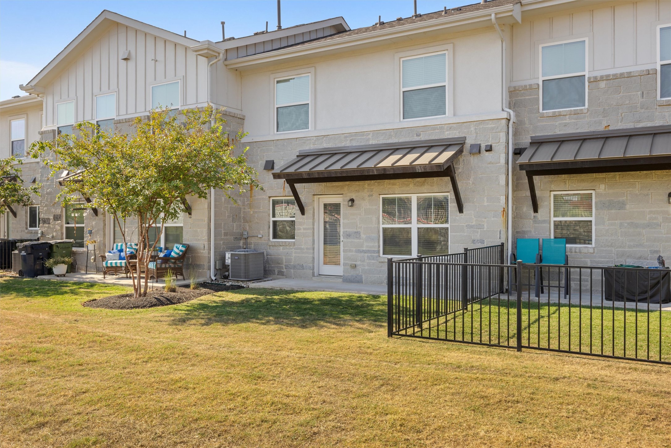 2056 Local Rebel Street Leander, TX 78641 - Photo 33 of 40 a view of a house with a swimming pool