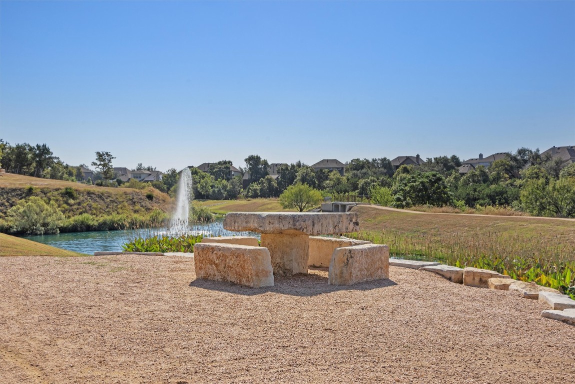 2056 Local Rebel Street Leander, TX 78641 - Photo 36 of 39 a view of swimming pool with a yard