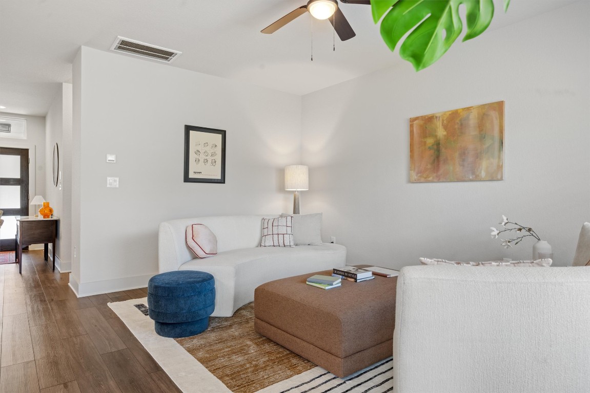 2056 Local Rebel Street Leander, TX 78641 - Photo 6 of 39 a living room with furniture and wooden floor