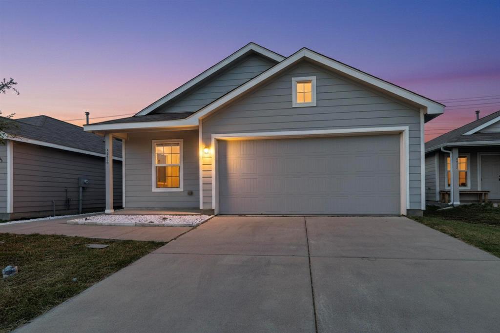 5516 McClelland Street Forney, TX 75126 - Photo 6 of 36 Ranch-style house featuring concrete driveway and a garage