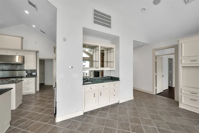 a view of kitchen and windows