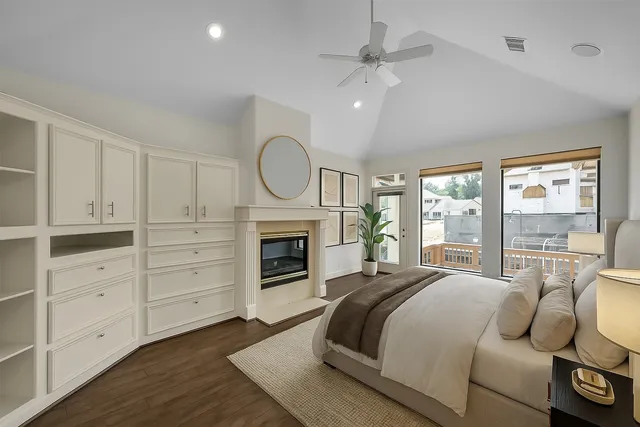 wooden floor in an empty room with a fireplace