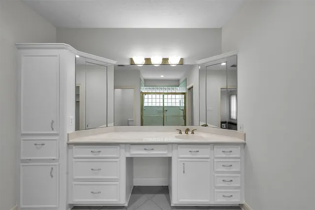 a view of a room with racks on the wall