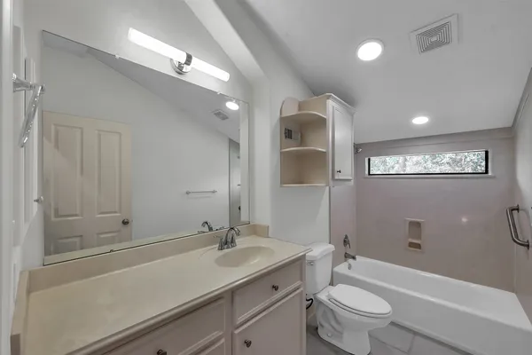 a view of a livingroom with furniture and wooden floor
